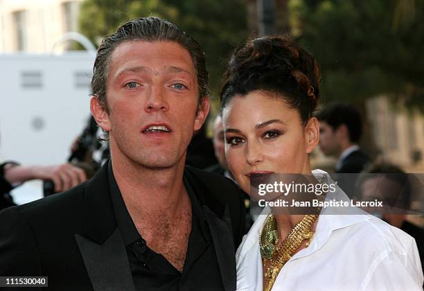 Monica Bellucci and Vincent Cassel during 2006 Cannes Film Festival - "Indigenes" Premiere at Palais des Festival in Cannes, France.