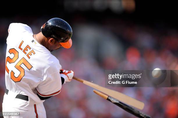 Derrek Lee of the Baltimore Orioles hits a broken bat single in the third inning against the Detroit Tigers on opening day April 4, 2011 at Camden...
