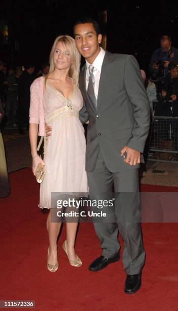 Melanie Slade and Theo Walcott during An Audience with Take That - Arrivals at The London Television Centre in London, Great Britain.