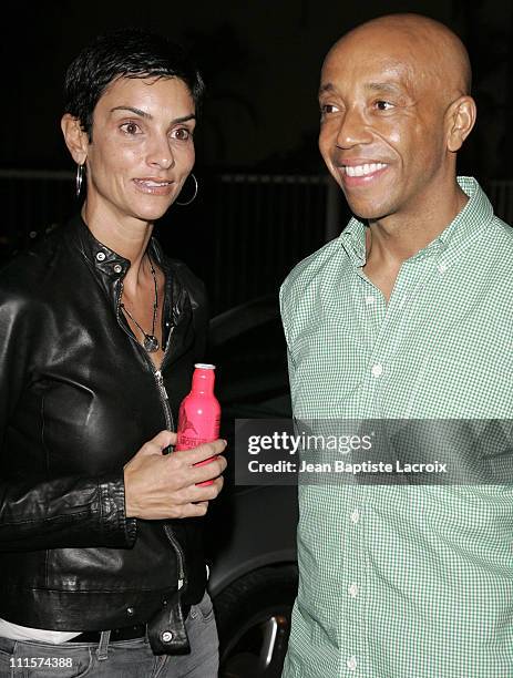 Ingrid Casares and Russell Simmons during Art Basel Miami Beach 2006 - Sightings on South Beach at South Beach in Miami Beach, Florida, United States.