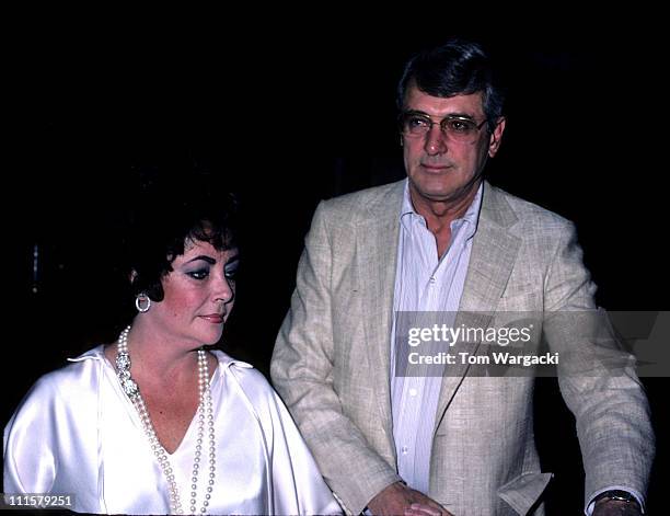 Elizabeth Taylor and Rock Hudson during Elizabeth Taylor and Rock Hudson leaving Savoy Hotel - June 1, 1980 at Savoy hotel in London, Great Britain.