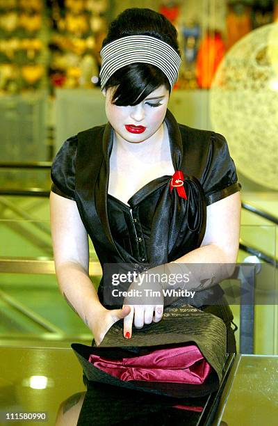 Kelly Osbourne helping out on the gift wrapping stand