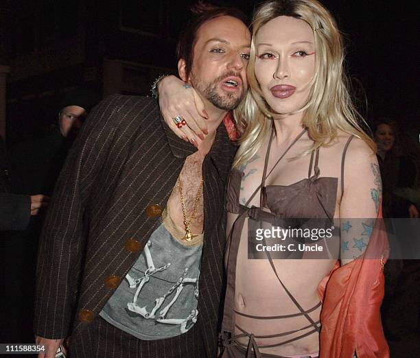 Pete Burns and guest during Gap RED Launch Party - Departures at Groucho Club in London, Great Britain.