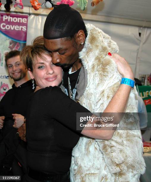 Jamie Ashe and Snoop Dogg during 2005 Radio Music Awards Backstage - Aces.com Raises Money for Make a Wish Foundation at Aladdin Hotel in Las Vegas,...