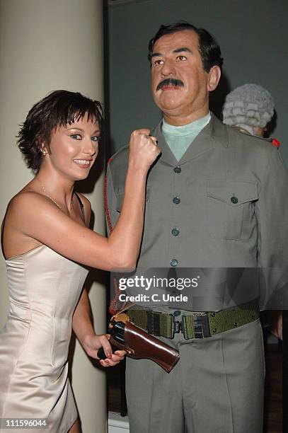 The Cheeky Girls with Saddam Hussein waxwork during Fabulous Gay Weddings Launch Party at Madame Tussauds in London, Great Britain.