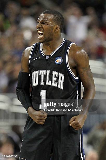 Shelvin Mack of the Butler Bulldogs celebrate after a shot to end the first half against the Connecticut Huskies during the National Championship...