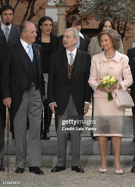 King Juan Carlos,poet and writer Juan Gelman and Queen Sofia pose for photographers after the Cervantes Prize ceremony, held at Alcala de Henares...