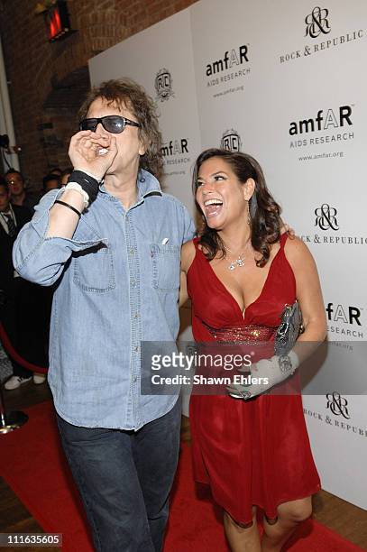 Mick Rock and Andrea Bernholtz at the 16th Annual amfAR Rocks Benefit September 24, 2007 at the Puck Building in New York City.