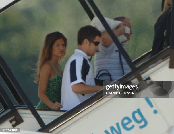 Carly Zucker and Joe Cole during England Football Players, Wives and Girlfriends Leave to Return to England after the FIFA 2006 World Cup at...