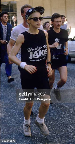 Madonna at The Mayfair Hotel jogging with bodyguards