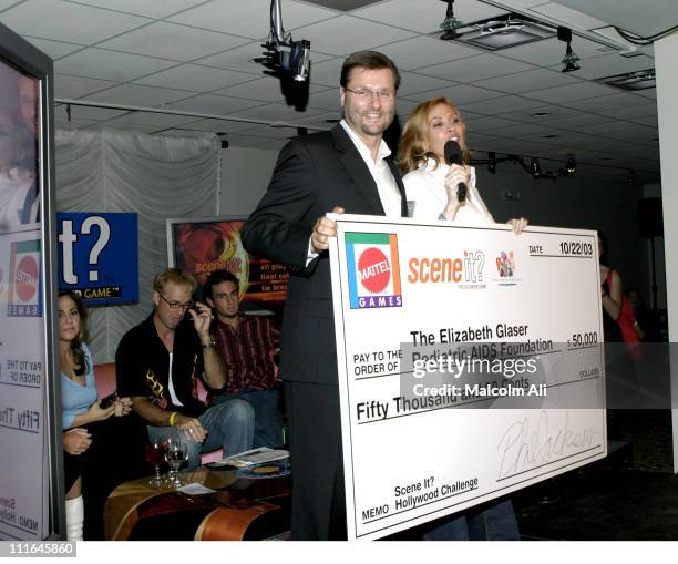 Phil Jackson,and Kim Webster during Scene It? Hollywood Challenge at Hollywood History Museum in Hollywood, California, United States.