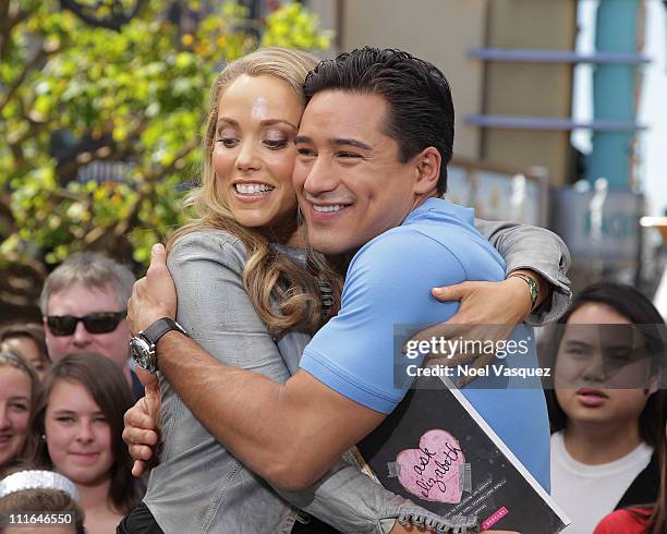 Elizabeth Berkley and Mario Lopez visit Extra at The Grove on April 4, 2011 in Los Angeles, California.