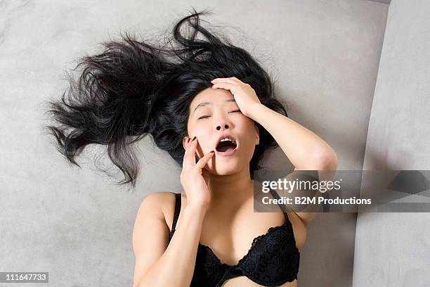 woman having an orgasm - asian pin up girls stock pictures, royalty-free photos & images