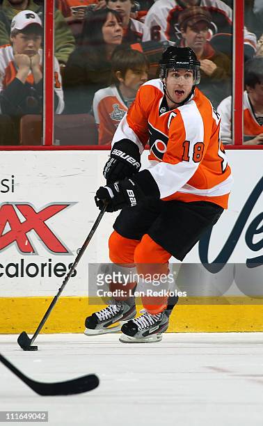 Mike Richards of the Philadelphia Flyers skates with the puck against the New York Rangers on April 3, 2011 at the Wells Fargo Center in...