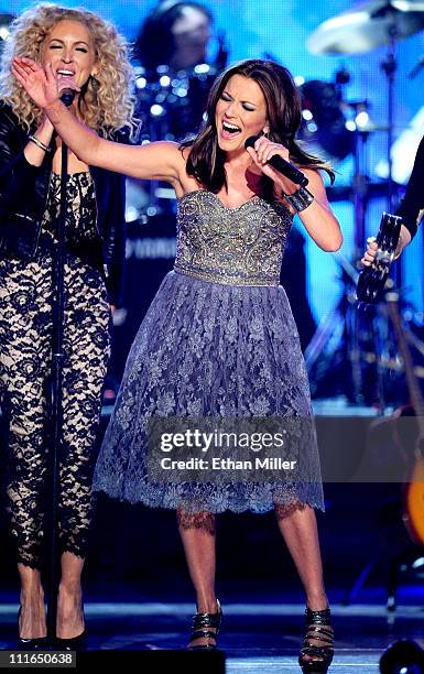 Singer Martina McBride and musician Kimberly Schlapman of Little Big Town perform onstage during ACM Presents: Girls' Night Out: Superstar Women of...