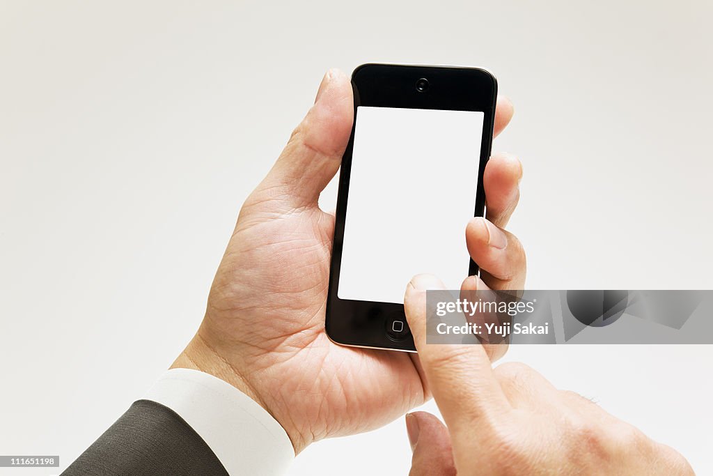 Man holding a smart phone