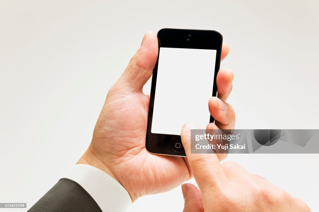 Man holding a smart phone