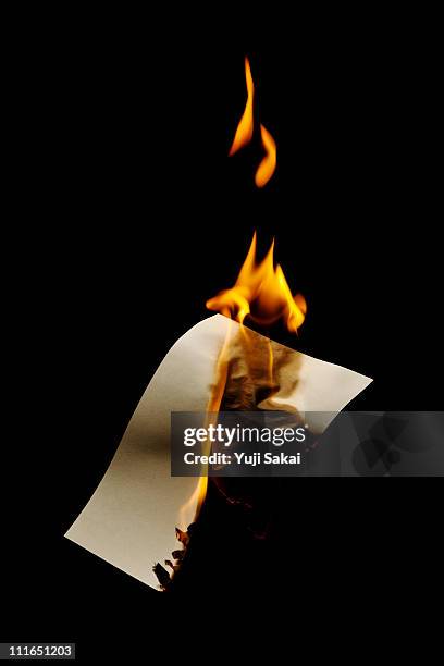 burning paper - burningon stock pictures, royalty-free photos & images