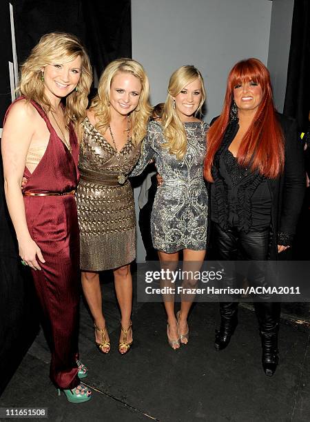 Honorees Jennifer Nettles, Miranda Lambert, Carrie Underwood and Wynonna Judd pose backstage during ACM Presents: Girls' Night Out: Superstar Women...