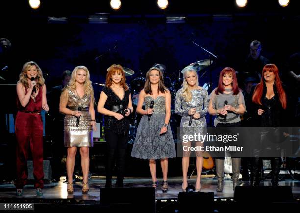 Musicians Jennifer Nettles, Miranda Lambert, Reba McEntire, Martina McBride, Carrie Underwood, Naomi Judd, and Wynonna Judd perform onstage during...