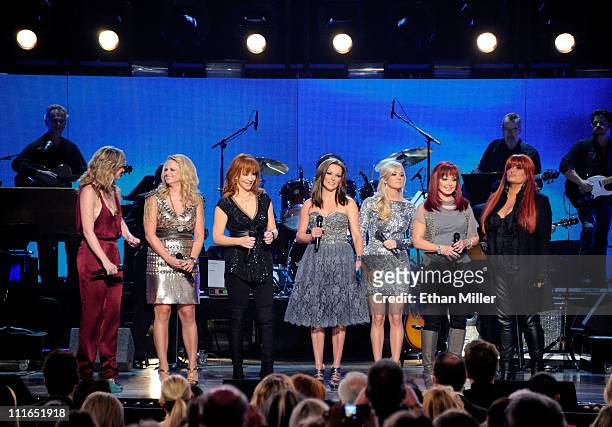 Musicians Jennifer Nettles, Miranda Lambert, Reba McEntire, Martina McBride, Carrie Underwood, Naomi Judd, and Wynonna Judd perform onstage during...
