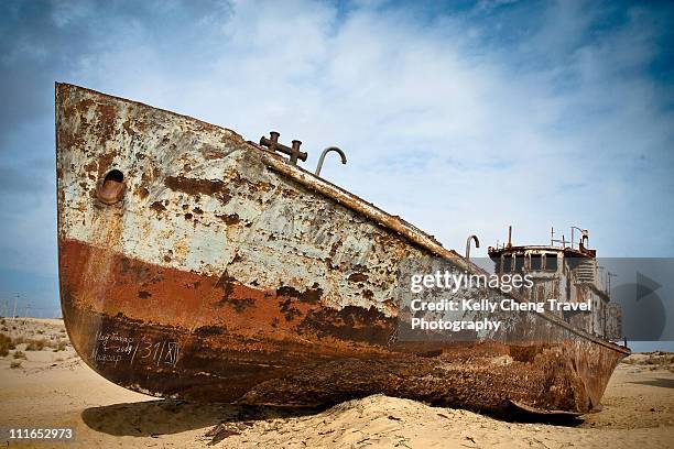 beached ships of aral sea - boat ruins stock pictures, royalty-free photos & images