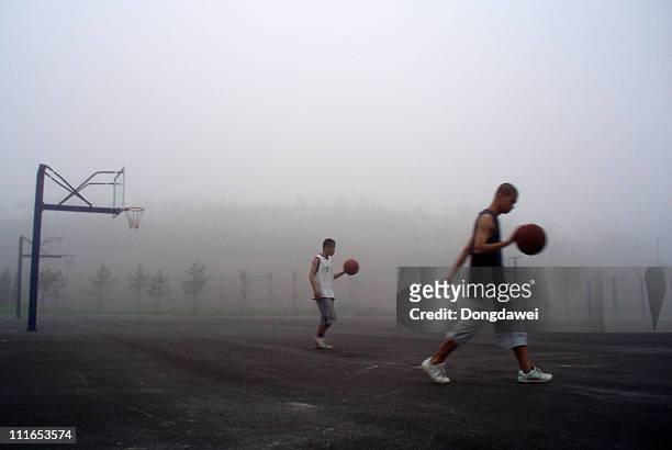 Young people in the fog at Dalian