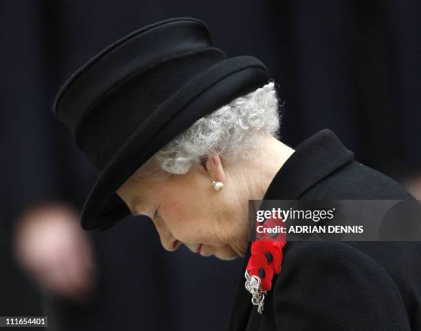 Britain's Queen Elizabeth II listens to a prayer during the Remembrance Sunday service at The Cenotaph in Whitehall, London, on November 9, 2008....