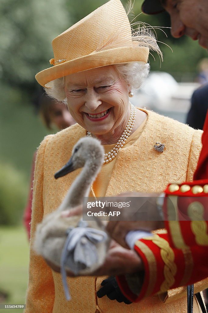 Britain's Queen Elizabeth II smiles as s