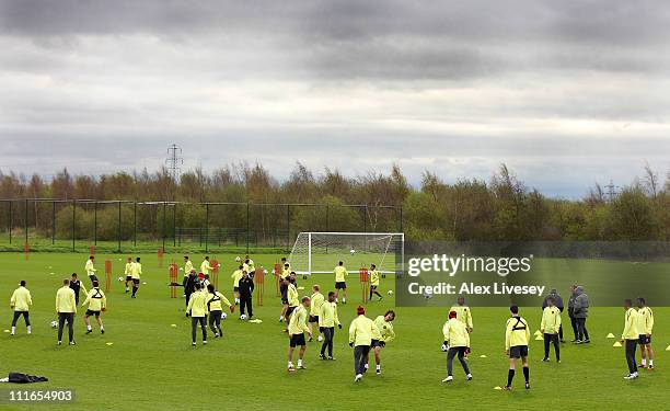 Manchester United players train during a Manchester United training session ahead of the UEFA Champions League quarter-final first leg match between...