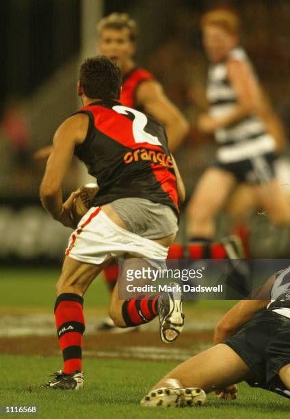 Mark Mercuri for Essendon loses his shorts during the Round 1 AFL match between the Geelong Cats and the Essendon Bombers, played at the MCG,...