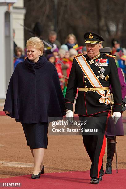 Lithuania's president Dalia Grybauskaite and King Harald V of Norway attend the official welcoming ceremony at the Royal Palace during the first day...