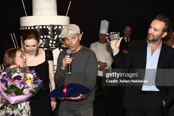 Mado Maurin, Sophie Brafman, Laurent Baffie, and Jean Dujardin attend Romy Schneider And Patrick Dewaere Awards 30th Anniversary Celebration at Le...