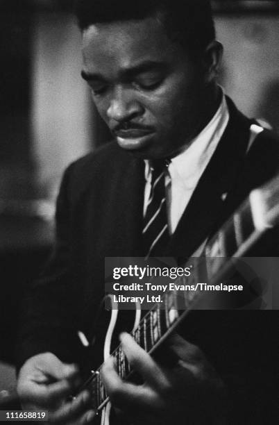 American blues guitarist Matt Murphy performs at the American Folk Blues Festival in London, 1963.
