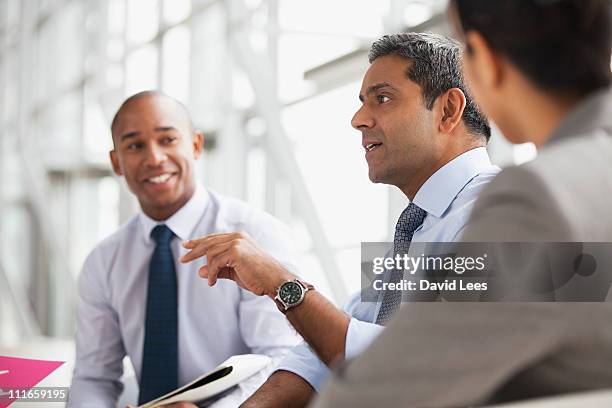 businessmen in meeting - india discussion imagens e fotografias de stock