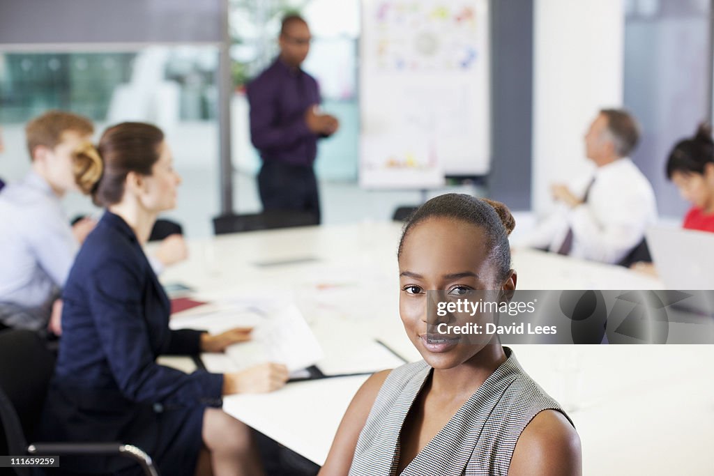 Businesspeople having meeting in board room