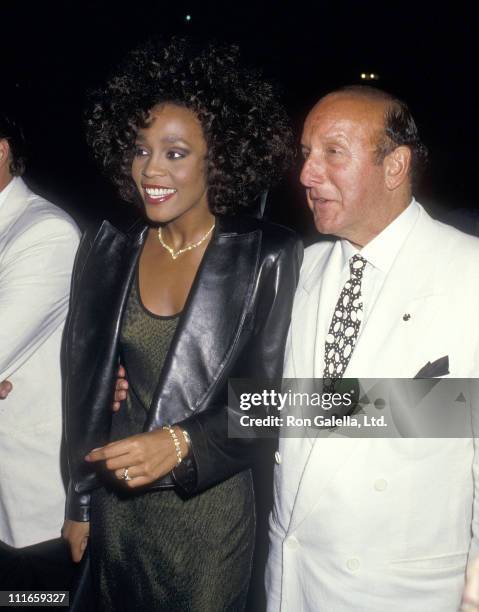 Singer Whitney Houston and Arista Records President Clive Davis attend a private party after her concert performance at Madison Square Garden on...