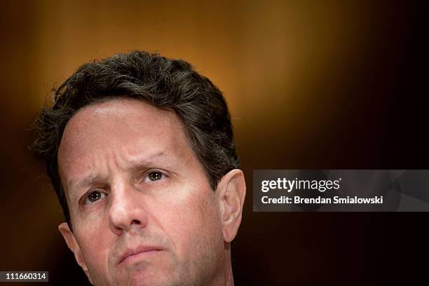 Secretary of the Treasury Timothy F. Geithner listens during a hearing of the Senate Appropriations Committee Financial Services and General...