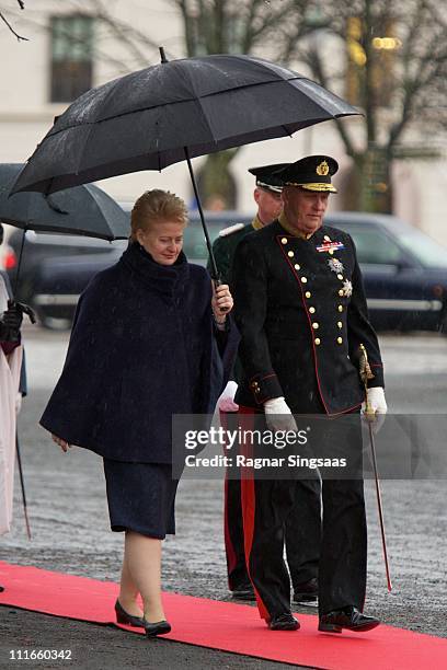 Lithuania's President Dalia Grybauskaite and King Harald V of Norway attend a wreath laying ceremony at the National Monument at Akershus Fortress on...