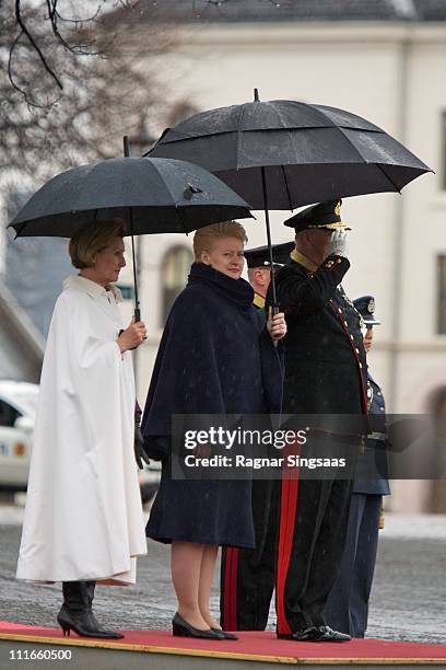 Queen Sonja of Norway, Lithuania's President Dalia Grybauskaite and King Harald V of Norway attend a wreath laying ceremony at the National Monument...