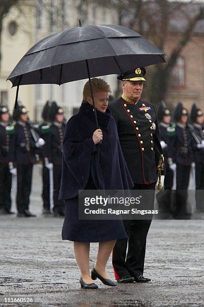 Lithuania's President Dalia Grybauskaite and King Harald V of Norway attend a wreath laying ceremony at the National Monument at Akershus Fortress on...