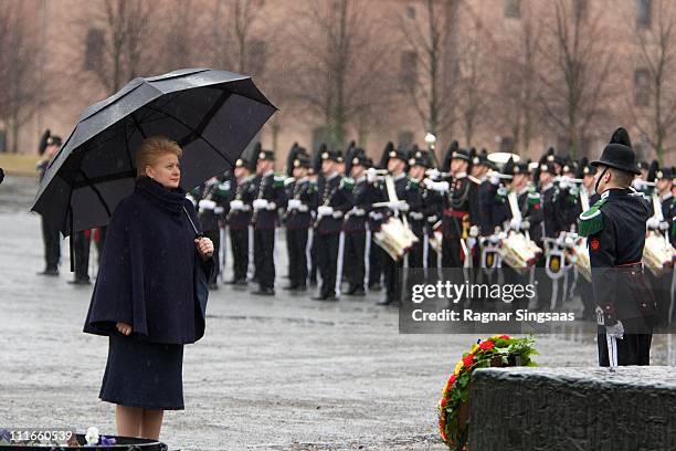 Lithuania's President Dalia Grybauskaite attend a wreath laying ceremony at the National Monument at Akershus Fortress on the first day of the...