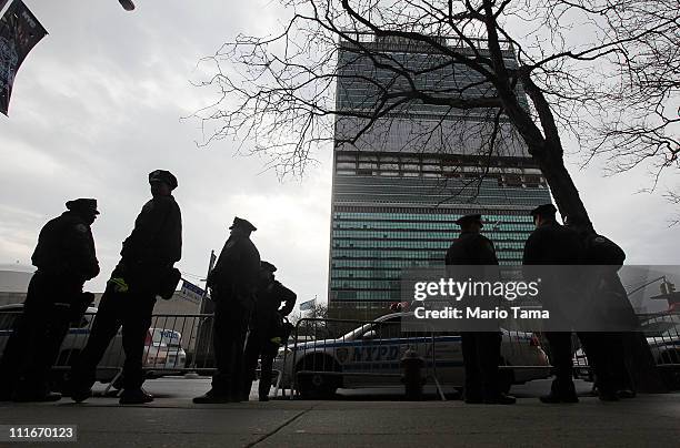 New York Police Department officers stand outside United Nations headquarters during a dirty bomb exercise on April 5, 2011 in New York City....