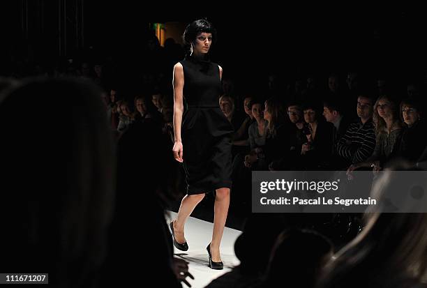 Model wears a creation by designer Svetlana Tegin on day 6 of the Mercedes-Benz Fashion Week Russia Fall/Winter 2011/2012 at the Congress Hall on...