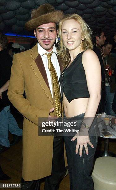 John Galliano and Lois Perry-Smith during Fashion Designer John Galliano Launch Party for his New Range of Menswear at Harvey Nichols Fifth Floor in...