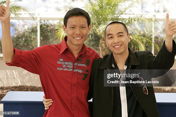 Sakada Kaewbuadee and Apichatpong Weerasethakul during 2004 Cannes Film Festival - "Tropical Malady" - Photocall at Palais Du Festival in Cannes,...