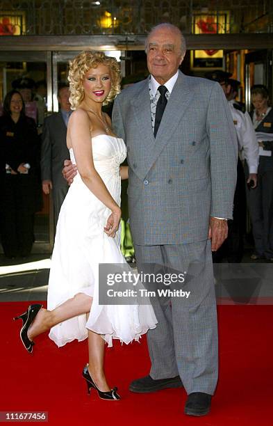 Christina Aguilera and Mohammed Al Fayed during Harrods' Summer Sale - Opening at Harrods in London, Great Britain.