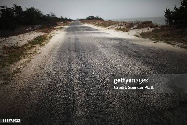 Road is seen near a stretch of beach road where police recently found human remains on April 5, 2011 in Babylon, New York. Working on the theory of a...