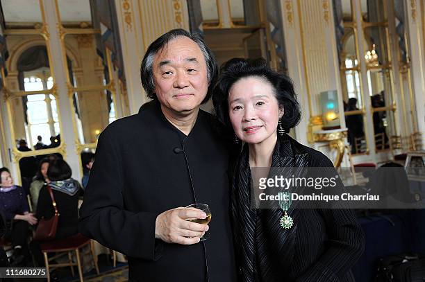 Yoon Jung-Hee pose with her Husband Kun-woo Paik after she receives the medal "Chevalier des Arts et lettres" at Ministere de la Culture on April 5,...