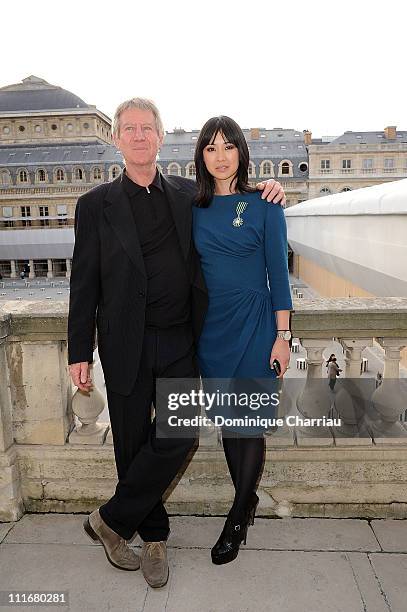 Regis Varnier and Linh-Dan Pham pose after she receives the medal "Chevalier des Arts et lettre" at Ministere de la Culture on April 5, 2011 in...